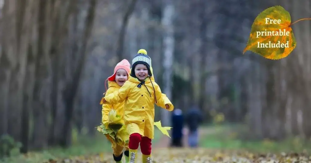 kids running in autumn leaves