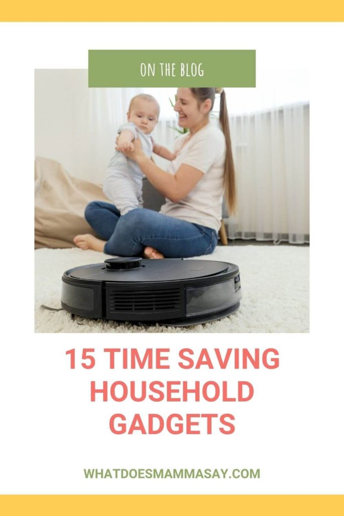 woman holding her baby and  a time saving roomba vaccuum 